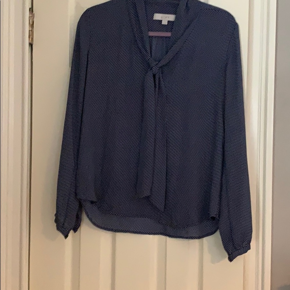 Navy and white polka dot blouse